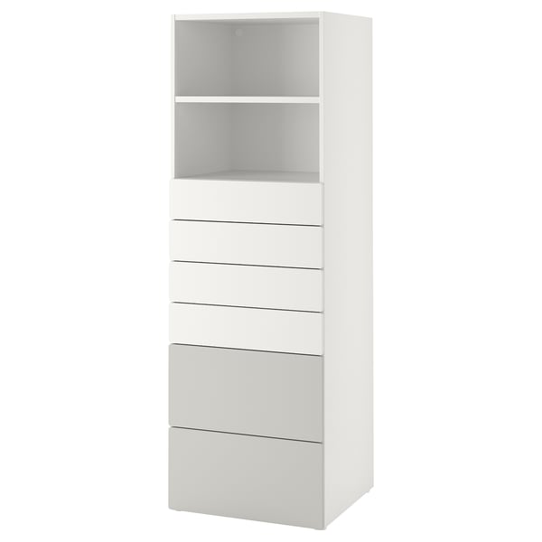 A white SMÅSTAD storage unit with an open shelf at the top and five drawers below, ideal for organising various items.