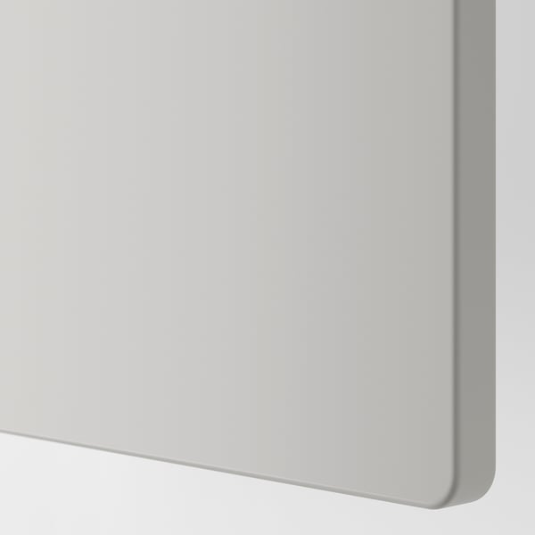 Close-up of sleek, white wardrobe with smooth edges, showcasing quality finish.