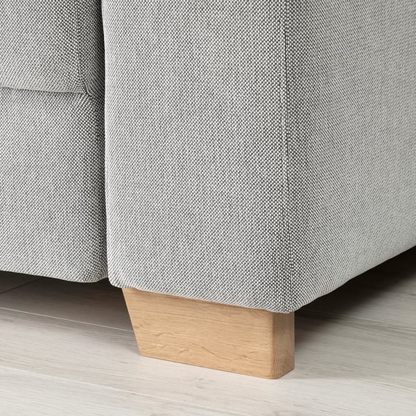 Modern sofa with clean lines. Solid oak legs offer stability and style. Grey fabric is soft and durable.
