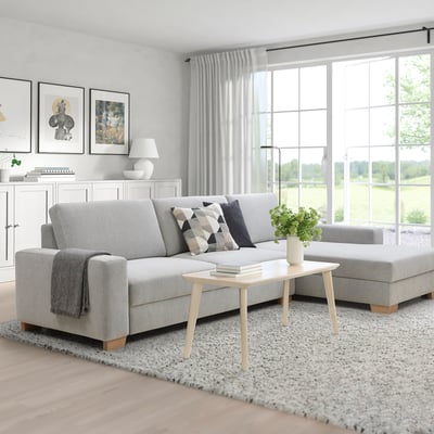 Modern grey SÖRVALLEN sofa set. Comfortable chaise, large cushions, wooden legs. Blends well with room decor. 3-seat & ottoman.