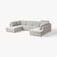 A modern, light grey SÖRVALLEN sectional sofa with a minimalist scandinavian design. It a u-shape with a chaise lounge, supported by wooden legs.