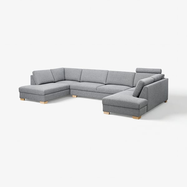 A modern, grey, u-shaped SÖRVALLEN sofa with wooden legs.
