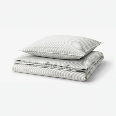A SOLFIBBLA duvet and pillow sham set, featuring grey and white stripes on soft, recycled cotton.
