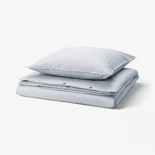 A SOLFIBBLA duvet cover set in blue and white stripes, made from soft cotton.