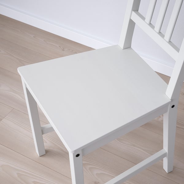 Sturdy white pine chair with high back, shown from top, clean and minimalists design.