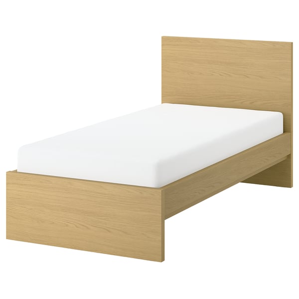 Modern light wood single bed with white mattress, clean simple design.