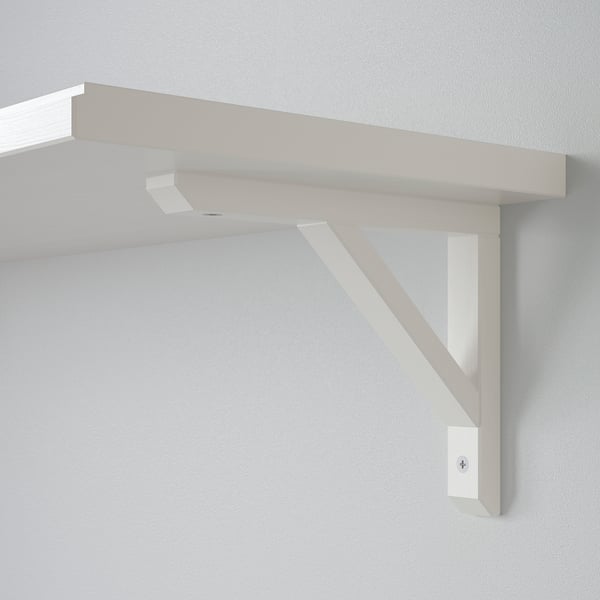A sleek, modern white wall-mounted shelf with a sturdy, angled bracket, securely attached to a plain wall.