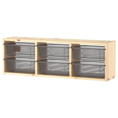 A TROFAST light wooden wall unit with three mesh storage boxes.