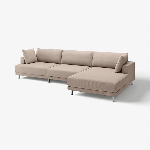 Beige sectional sofa with modern design, chrome legs, comfortable cushions.