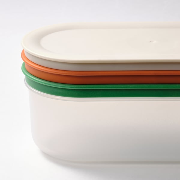 Stacked round storage containers with colourful seals, white bodies, and secure lids.