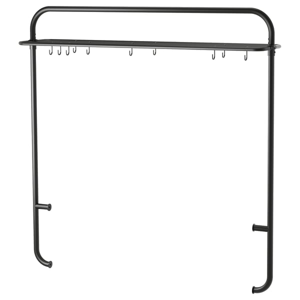 Black metal kitchen rack with hooks and shelf, minimalist design.