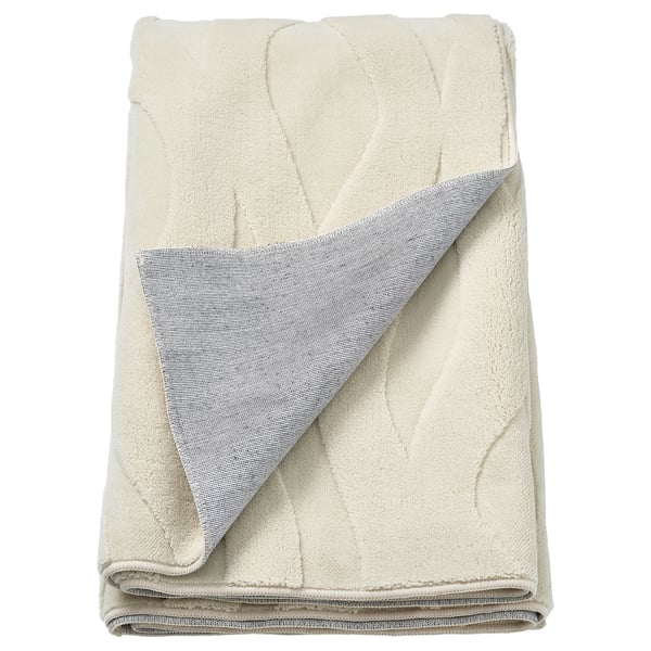Folded vaxelfel rug, off-white, 3d wavy design, recycled polyester & rubber.