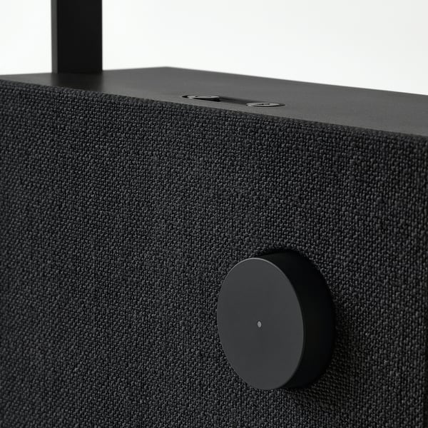 Black VAPPEBY speaker, close-up with textured fabric.