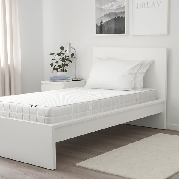 Minimalist bedroom with single bed & vattap foam mattress.