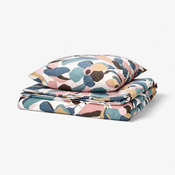 Folded leaf-patterned duvet set, vibrant colours, soft cotton/lyocell.