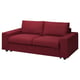 Red fabric sofa-bed, modern design, two-seater, upholstered cushions, wooden legs.