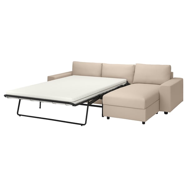 The VIMLE sectional sofa, beige, converts into a bed with a thick mattress. It a chaise lounge, storage, and a 10-year guarantee.