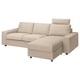 Displays a beige, modular VIMLE sofa with a chaise longue on the right, featuring a sleek, modern design and upholstered in a beige fabric.