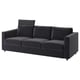A modern VIMLE sofa in dark grey. It a sleek design, three cushions, and a headrest for comfort.