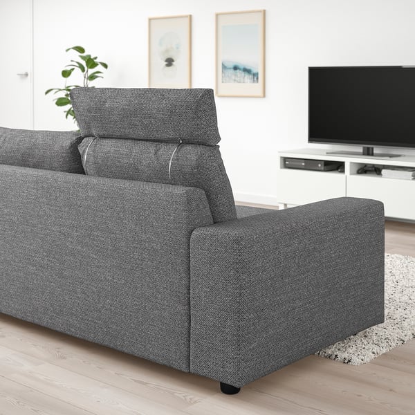 Modern VIMLE grey sofa in living room. Its sleek design fits well with tv, decor, and plant. Comfortable and stylish for cosy spaces.
