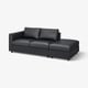 Black leather modern sofa with a storage footrest.
