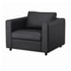 Modern black leather armchair, square design, dark and sleek.