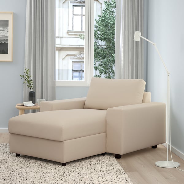 Vimble beige sofa with storage, wide armrests, and minimalist design in a bright, cosy room.