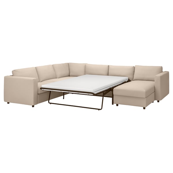 VIMLE sectional sofa-bed in beige, soft fabric, l-shape with pullout mattress.
