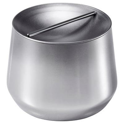 Rund, sølvfarvet metalbeholder med låg og ventilationsåbning til køkkenopbevaring.