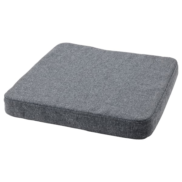 Grå firkantet sædehynde med memory foam-polstring for komfort.
