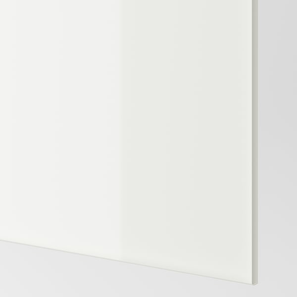 Skarpt hvidt glaspanel, slankt og moderne. Reflekterende overflade tilføjer rummelighed og lys, ideel til moderne indretning.