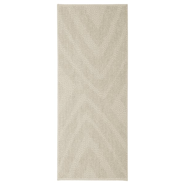 FULLMAKT tæppe i beige. Rektangel, minimalistisk design. Velegnet indendørs/udendørs. Fremstillet af polyester.