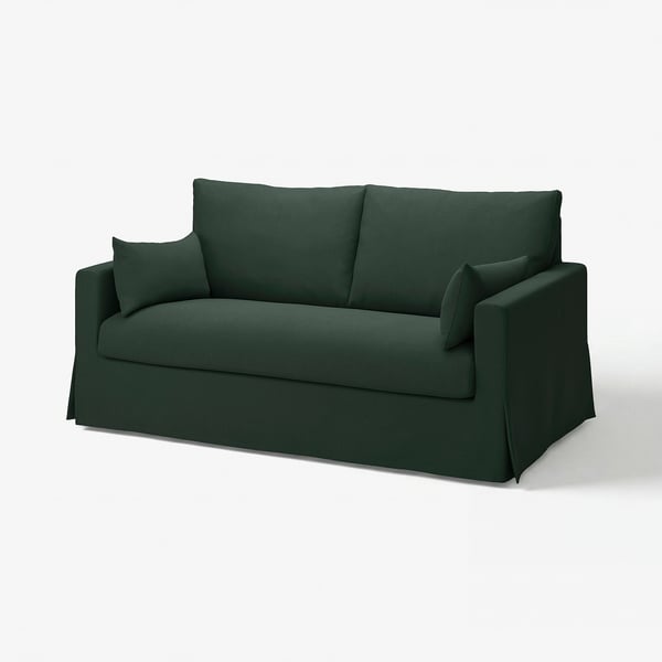 Mørkegrøn sofa, slankt design, blødt stof, neutral indretning.