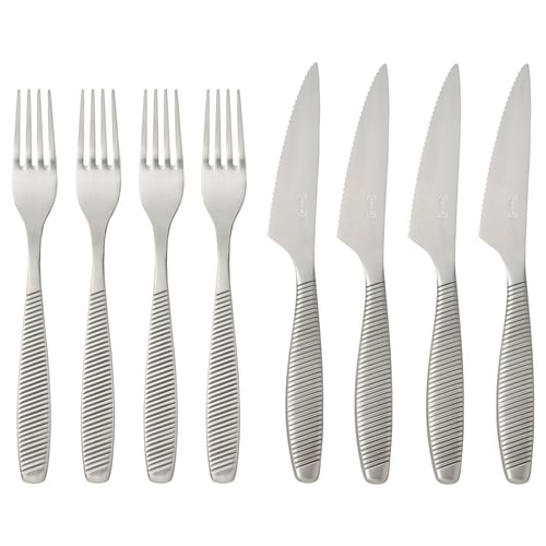 IKEA 365+ bestiksæt med gafler i rustfrit stål og savtakkede knive. Moderne design med ribbede håndtag for greb. Otte stykker, rene og funktionelle.