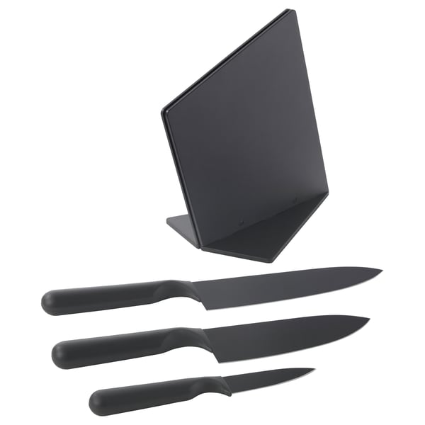 Sort knivsæt med blok, med non-stick klinger og ergonomiske håndtag, ideel til køkkenforberedelse.
