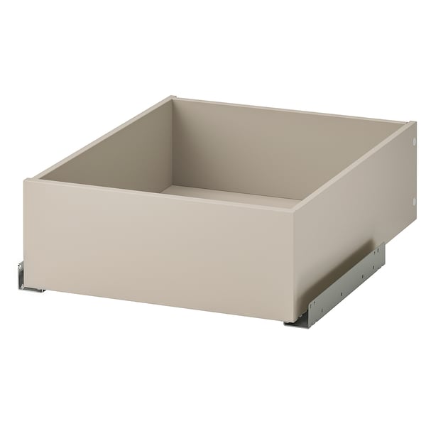 KOMPLEMENT skuffen i beige med en soft-close-mekanisme til organisering af tøj eller tilbehør.