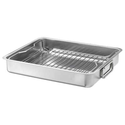 En KONCIS bradepande i rustfrit stål med grillrist, perfekt til brug i ovn eller grill.