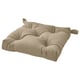MALINDA beige stoleunderlag, firkantet, puffy design med håndtag, lavet af genbrugsmaterialer.