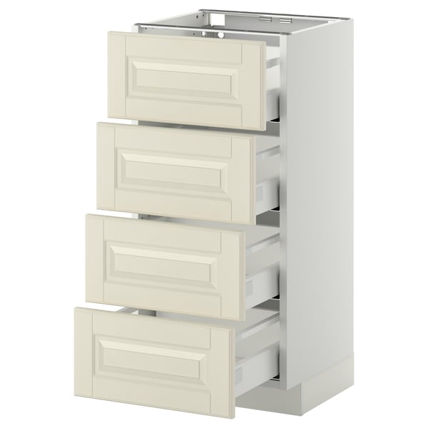Et hvidt METOD køkkenskab med fire bodbyn råhvide skuffer med skrå kanter, sat mod en hvid baggrund.