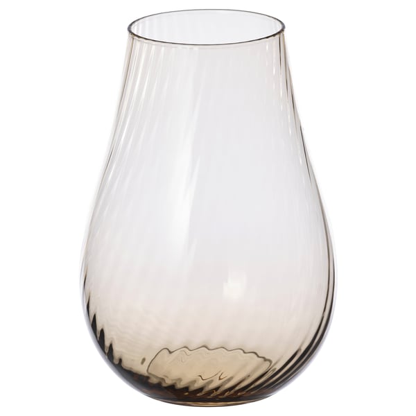 En PÅSKÖTRÄD vase, en slank, lysebrun glasvase med dråbeform og hvirvlende mønstre indeni.