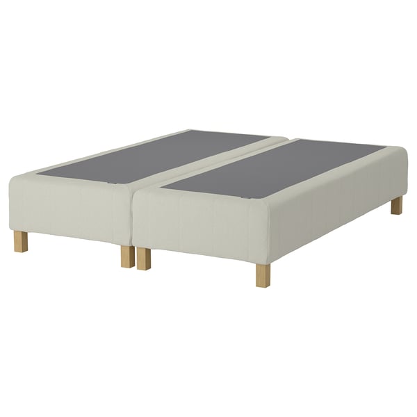RENFJÄLLET sengebunden er hvid med lysegrå sektioner, der understøttes af træben. Det er polstret og et enkelt, moderne design.