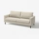 En beige SALTSJÖBADEN-sofa. Den har et rent, enkelt design med bløde puder og træben. Sofaen er polstret i et let, neutralt stof.