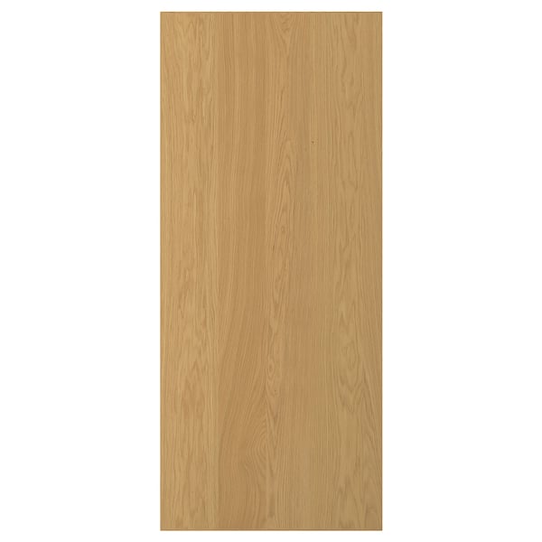 En SINARP lysebrun trædør. Den er lavet af egefiner med en massiv egetræskant med et slankt rektangulært design.