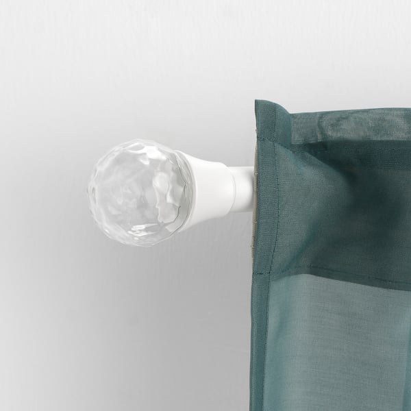 SOLBLOMMOSSA Hvid glasfinial, lille, moderne, elegant. Aluminiumsbund. Ideel til gardinstænger, slankt design.