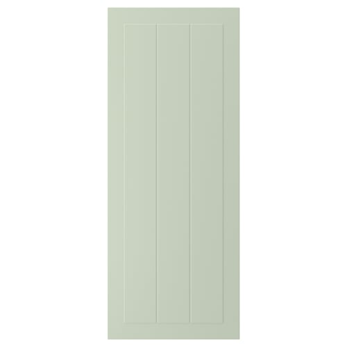 En grøn STENSUND skabslåge med et rillet paneldesign, fremstillet af fiberplade med en glat finish, der er nem at rengøre.
