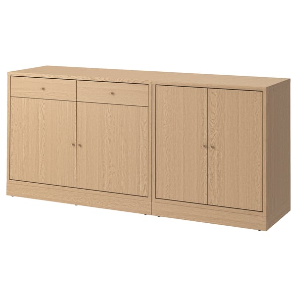 Let TONSTAD skab i træ med to skuffer og fire låger. Moderne, enkelt design til opbevaring af spisepladsen.