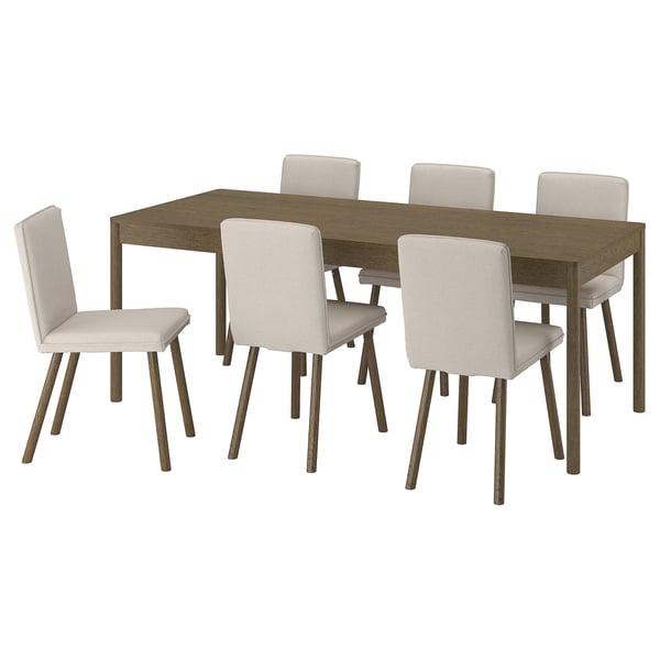 Moderne spisebordssæt med træbord og seks beige stole.