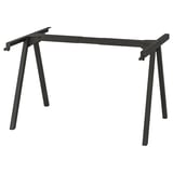 Et TROTTEN justerbart sort skrivebordsstel med et slankt design med fire robuste ben for stabilitet.