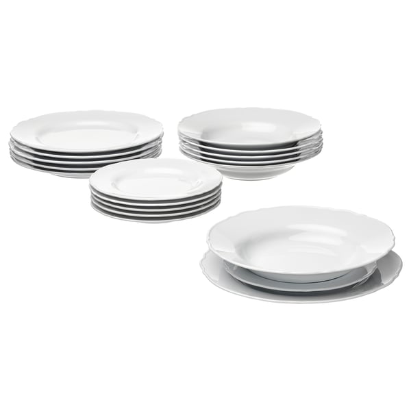 Hvide UPPLAGA porcelænsfade, firkantede med flæsekanter, pænt stablet.