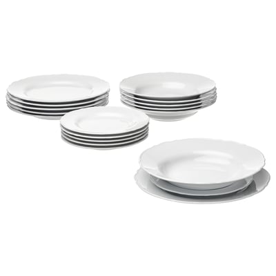 Hvide UPPLAGA porcelænsfade, firkantede med flæsekanter, pænt stablet.